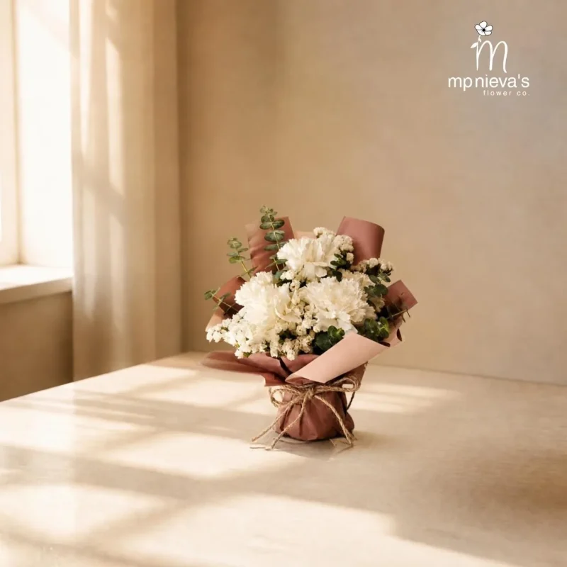 Lullaby mini bouquet of white carnations and eucalyptus by MP Nieva's Flower Shop