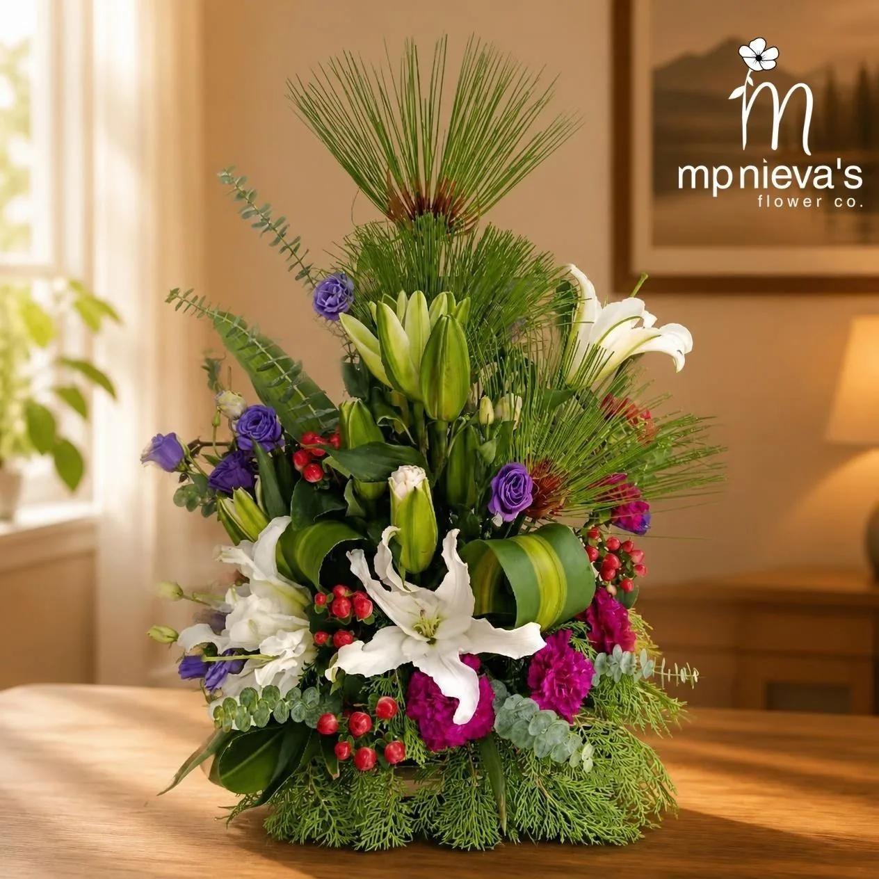 Remembrance memorial arrangement with white lilies, purple lisianthus and carnations by MP Nieva's Flower Shop